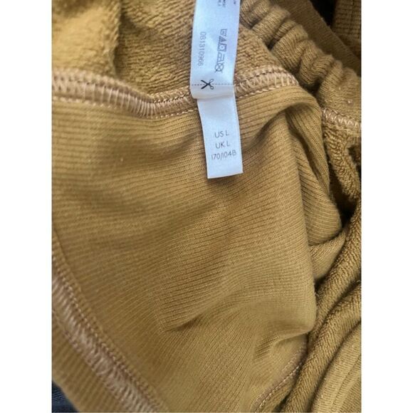 Free People Movement Burnt Gold Circle Back Crop Top Large - Picture 7 of 7